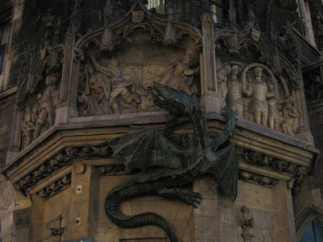 Dragon clinging to wall