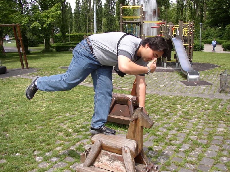 Robin riding a horse
